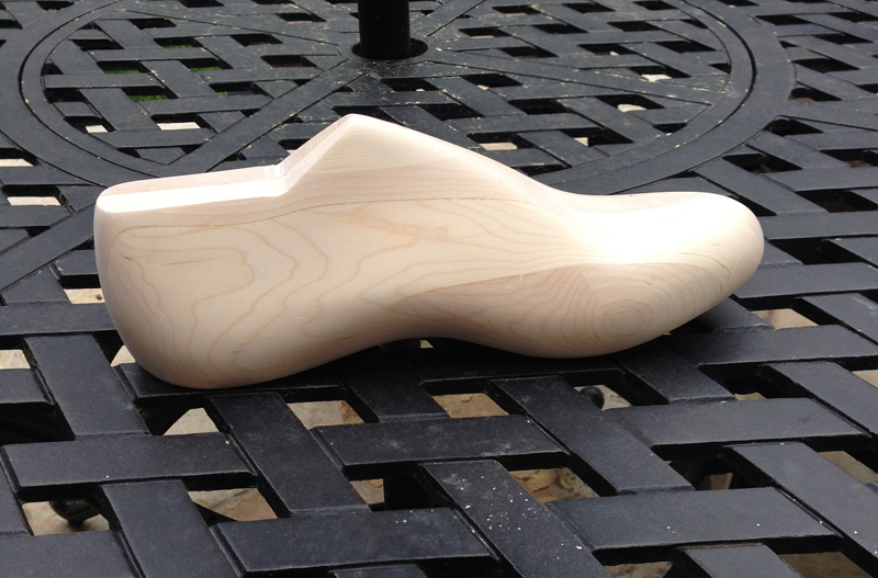 A shoe last (form) carved by Jesse.