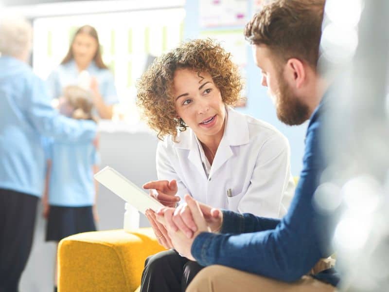 Doctor With Patient