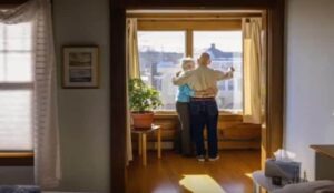 Elderly Couple by Window