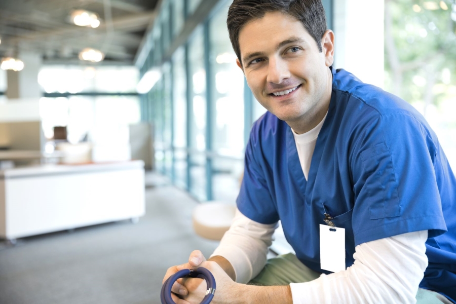 A man in healthcare smiling