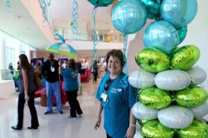 Nurse with Balloons LCMC Health