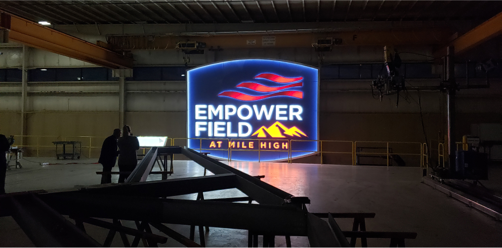 Empower Field - Night signage