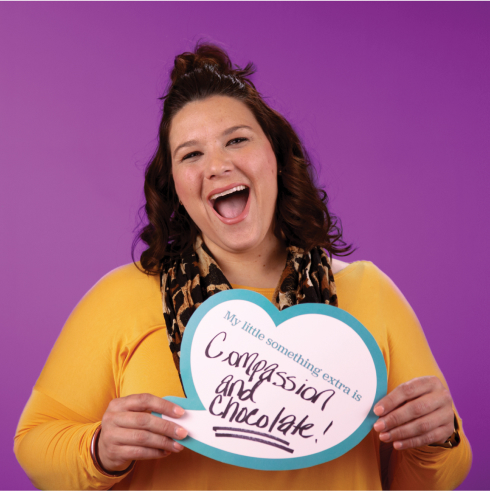 LCMC - Girl with smiling heart sign