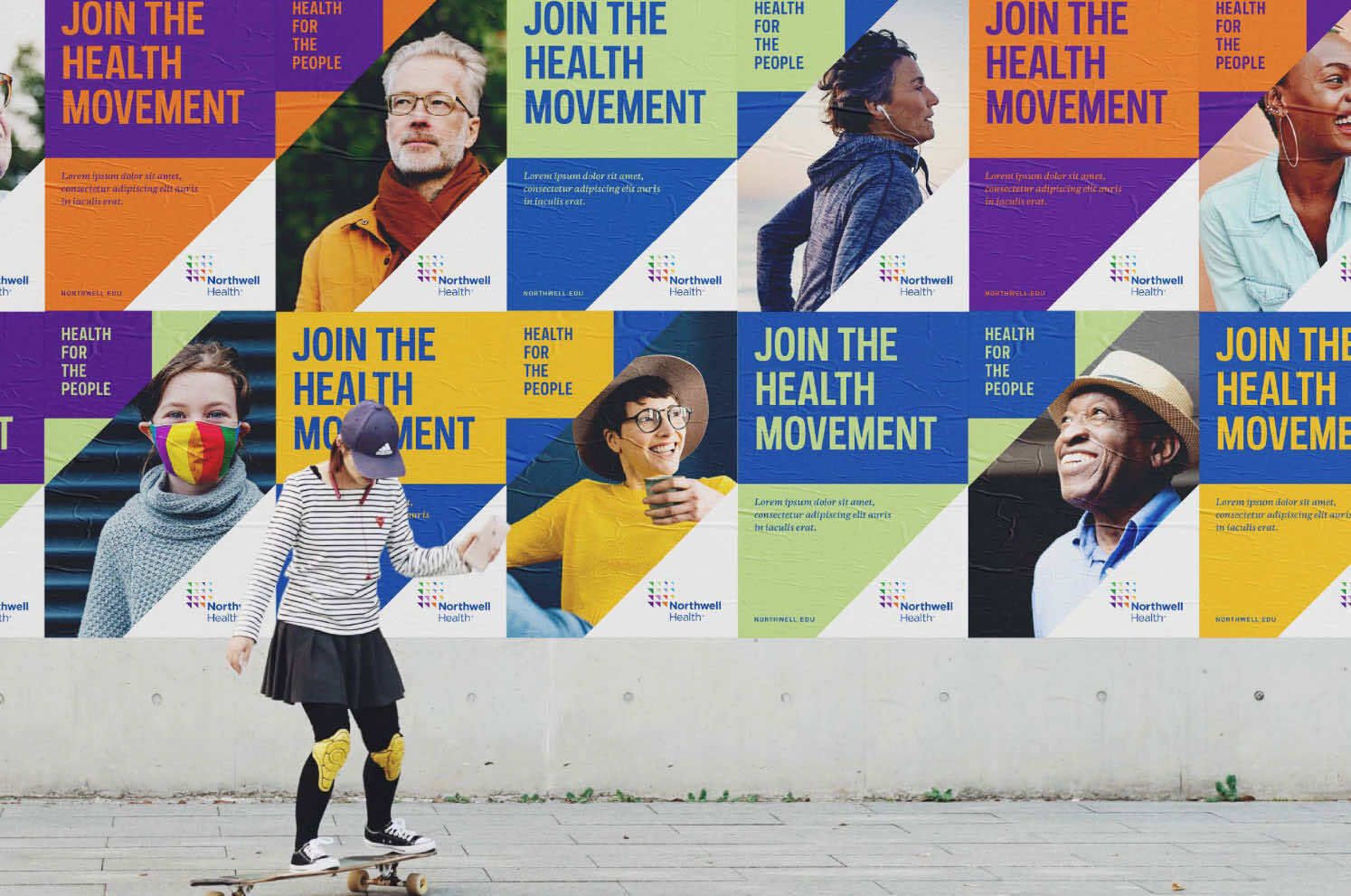 Northwell - Poster wall behind girl on a skateboard
