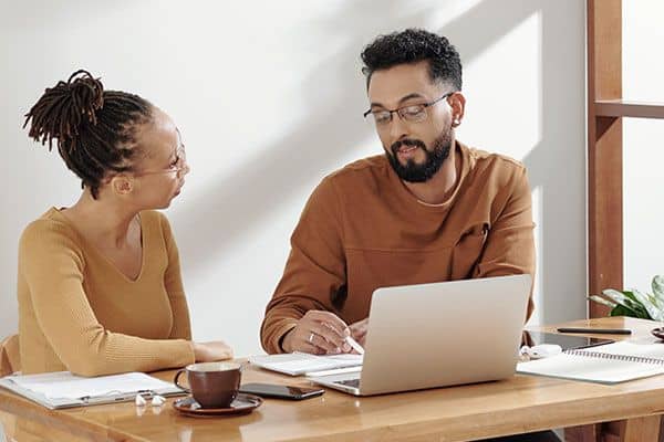 two people and a computer