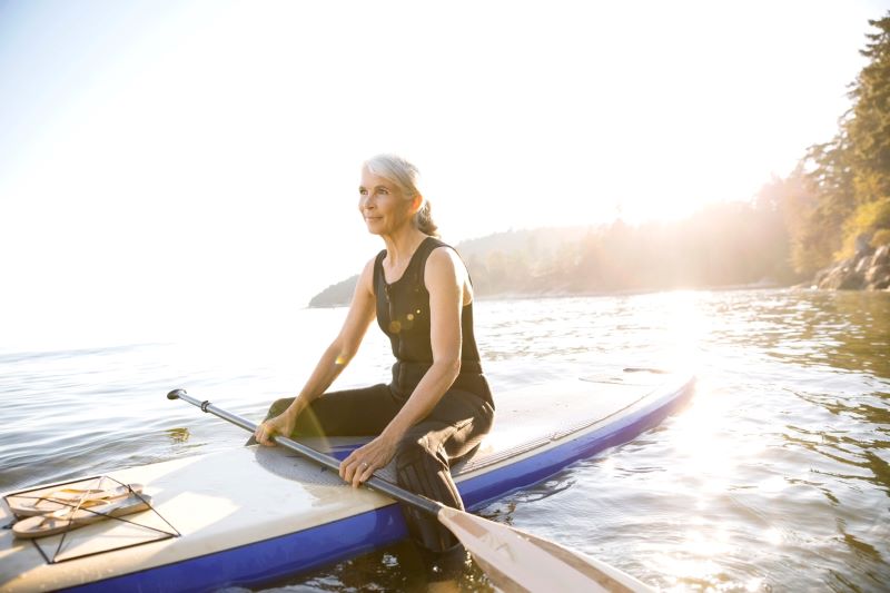 woman floating in a boat